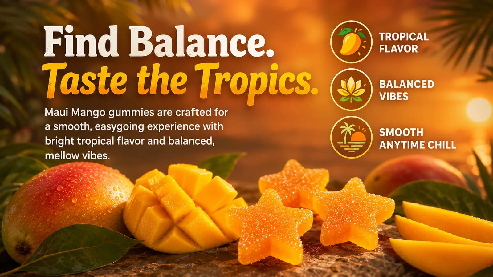 A wide shot of two orange star gummies beside a scored mango half and mango slices, with palm leaves and sunset light behind.