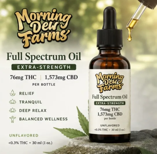 The bottle standing on a rock in daylight with a hemp leaf behind it and a full dropper to the right.